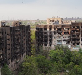 War in Ukraine. The ruins of residential buildings burned down and destroyed by Russian troops in Mariupol.