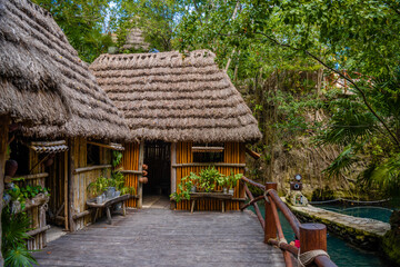 Fototapeta na wymiar Hut in tropical jungle forest, Playa del Carmen, Riviera Maya, Yu atan, Mexico