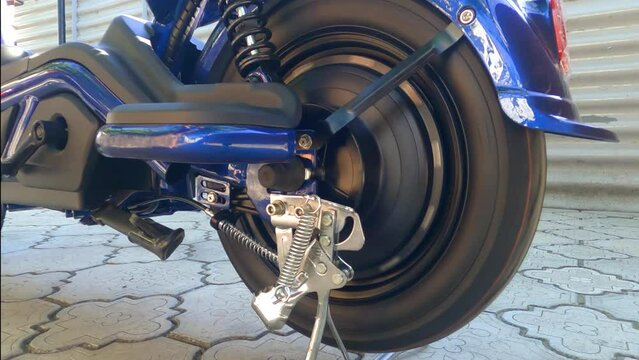 Spinning wheel on an electric bike. Close Up