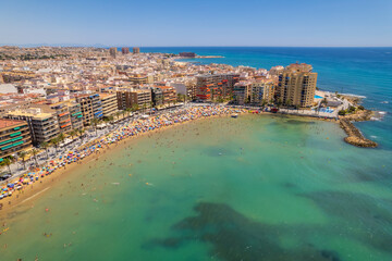 Aerial view of Torrevieja during sunny summer day. Province of Alicante, south of Spain, Costa Blanca. Spain. Travel and tourism concept. - obrazy, fototapety, plakaty