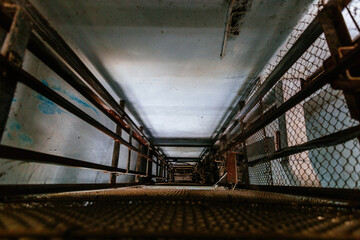 Broken elevator shaft in abandoned building