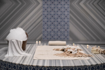 Foam massage and scrub in traditional Turkish bath
