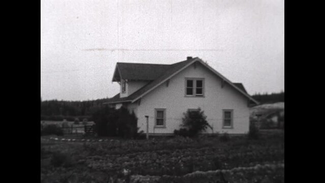 Alaskan Homes 1937 - Homes and farms near Palmer, Alaska in 1937.