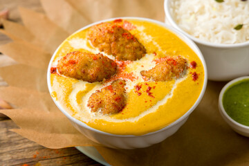 malai kofta with indian spices on bowl, indian cuisine macro close up