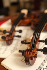 Focus on the top of a violin in a repair shop