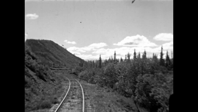 Riding the Alaska Railroad 1937 - A first person point of view from the engine of a train as it travels on the Alaska Railroad in 1937.