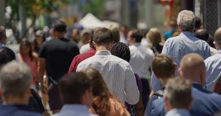Crowd of people walking city street © blvdone