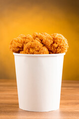 Crispy fried chicken in the bucket. Chicken bucket.