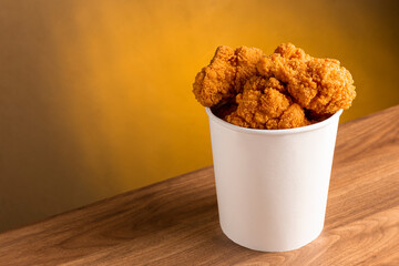 Crispy fried chicken in the bucket. Chicken bucket.