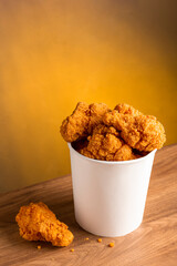 Crispy fried chicken in the bucket. Chicken bucket.