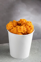 Crispy fried chicken in the bucket. Chicken bucket.