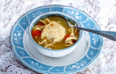 Chicken soup and matzo ball, a classic jewish dish, ofton called jewish pennicilian 