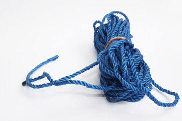 Blue plastic rope reel with isolated white background