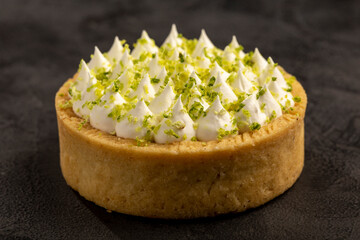 Tasty lemon tartlet on the table.