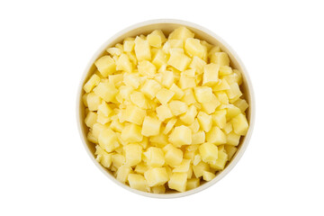 Raw potato cubes in bowl isolated on white background.