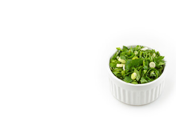Coriander in ramekin isolated on white background.