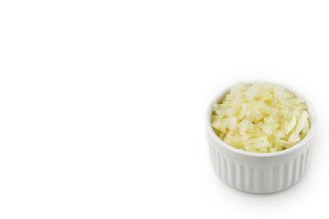 Onion sliced ​​in ramekin isolated on white background.