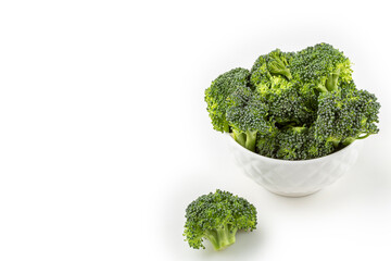 Broccoli pieces isolated on white background.