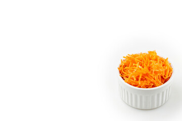 Grated carrot isolated on white background.