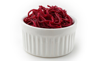 Grated beets isolated on white background.