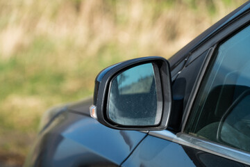 Fototapeta na wymiar side rear-view mirror on a car