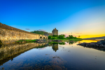 Fototapeta na wymiar Eilean Donan Castle at sunset in Scotland