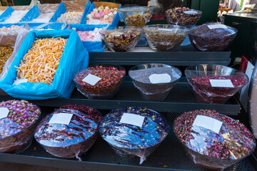 Closeup colorful spices flowers presented market stall
