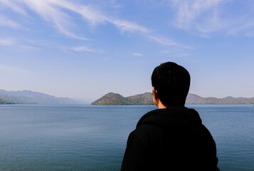 The man watching  beautiful view on dam