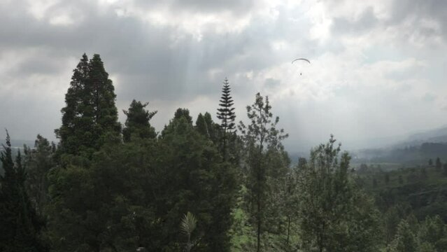 Paragliding Recreational Competitive Adventure Sport of Flying Paragliders from Hilltop in Puncak Cisarua Bogor, Indonesia