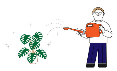 植物に水やりをする男性