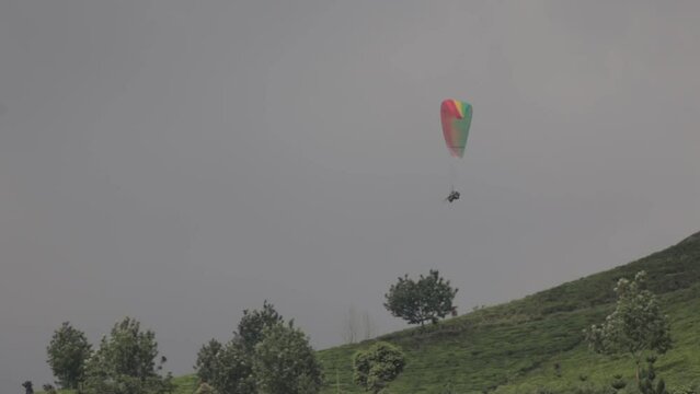 Paragliding Recreational Competitive Adventure Sport of Flying Paragliders from Hilltop in Puncak Cisarua Bogor, Indonesia