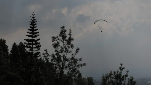 Paragliding Recreational Competitive Adventure Sport of Flying Paragliders from Hilltop in Puncak Cisarua Bogor, Indonesia