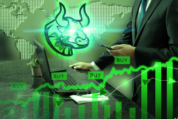 A businesmen using a smartphone, to check and analyzing market data with bull shape symbol of stock market trends on them, stock market exchange on double exposure. Bull market, Business concept