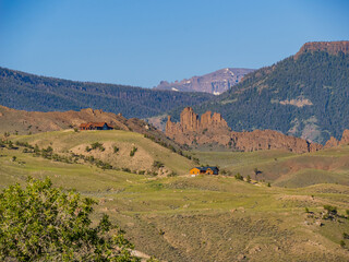 Fototapeta premium Sunny view of beautiful rural house on mountain