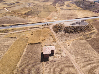 Aerial view of highway in Peruvian Andes. Rural scene during dry season in Cusco Peru.