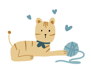 Tabby cat with a bow plays with a blue ball of thread