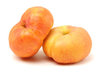 chinese flat peaches on white background 
