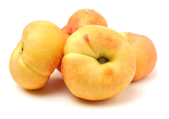 chinese flat peaches on white background 