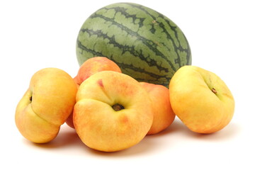 chinese flat peaches on white background 