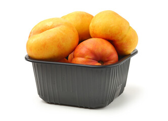 chinese flat peaches on white background 