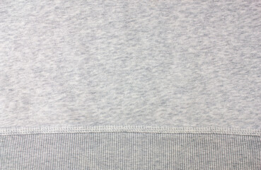 Texture of white gray hoodie sweatshirt. White sweatshirt fabric texture.
