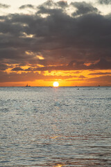 Portrait view of the stunning shoreline in Hawaii at sunset. 