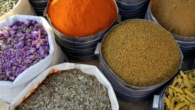 Moroccan rural spice market in a weekly food bazaar in Foum Zguid, Morocco. 4k food background footage.