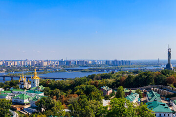 View of Kiev Pechersk Lavra (Kiev Monastery of the Caves),  Motherland Monument and the Dnieper river in Ukraine. View from Great Lavra Bell Tower