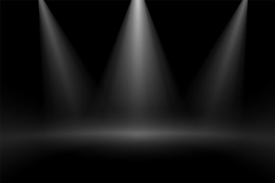 black background with three focus stage lights effect