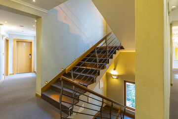 Fototapeta premium Interior of a hotel corridor with stairs