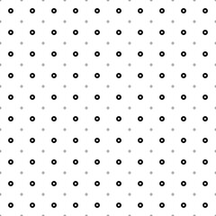 Square seamless background pattern from black play symbols are different sizes and opacity. The pattern is evenly filled. Vector illustration on white background