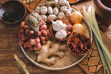 Various fresh vegetables and spices on wooden table, Thai food concept