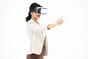 Studio shot of Millennial Asian smart professional successful businesswoman ceo entrepreneur wearing virtual reality VR goggles headset standing smiling holding hand touching air on white background