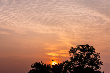 Fototapeta premium Amazing cloud formation in colourful sky during a monsoon sunrise morning